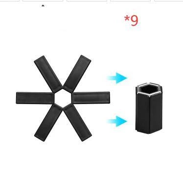 Foldable, heat-resistant pan mat made of sturdy ABS material with anti-slip and heat-insulating features to protect surfaces and hands