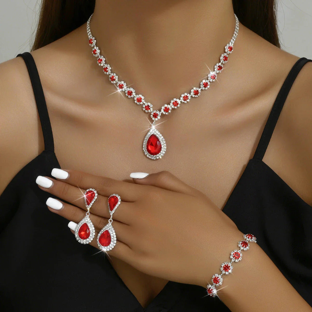 Bridal jewelry set with necklace, earrings, and bracelet featuring a sun and moon design with rhinestones