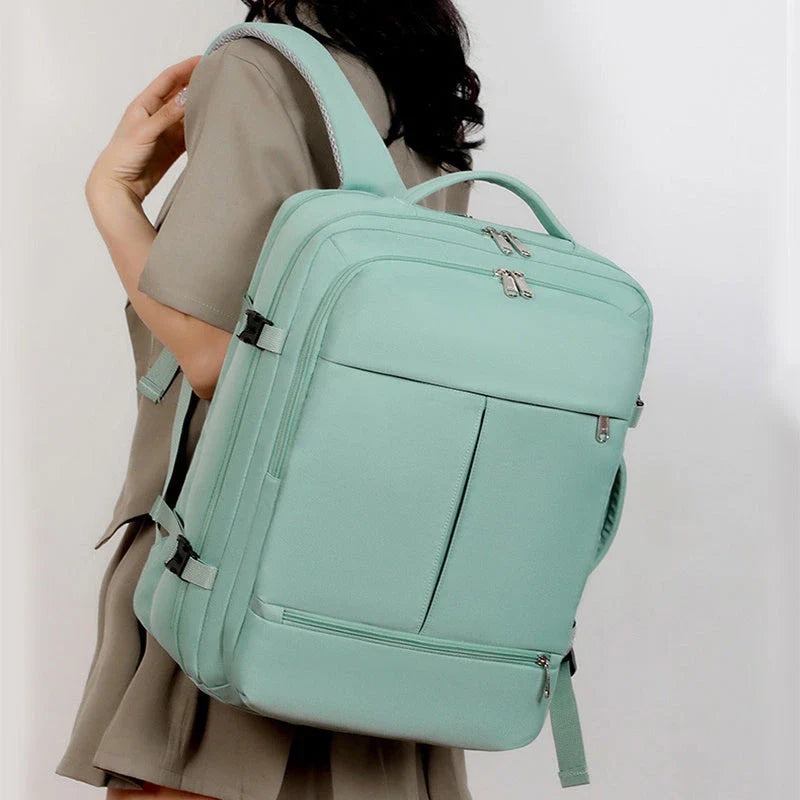 A stylish and high-capacity backpack with multiple pockets and zippers, designed for business and travel use.