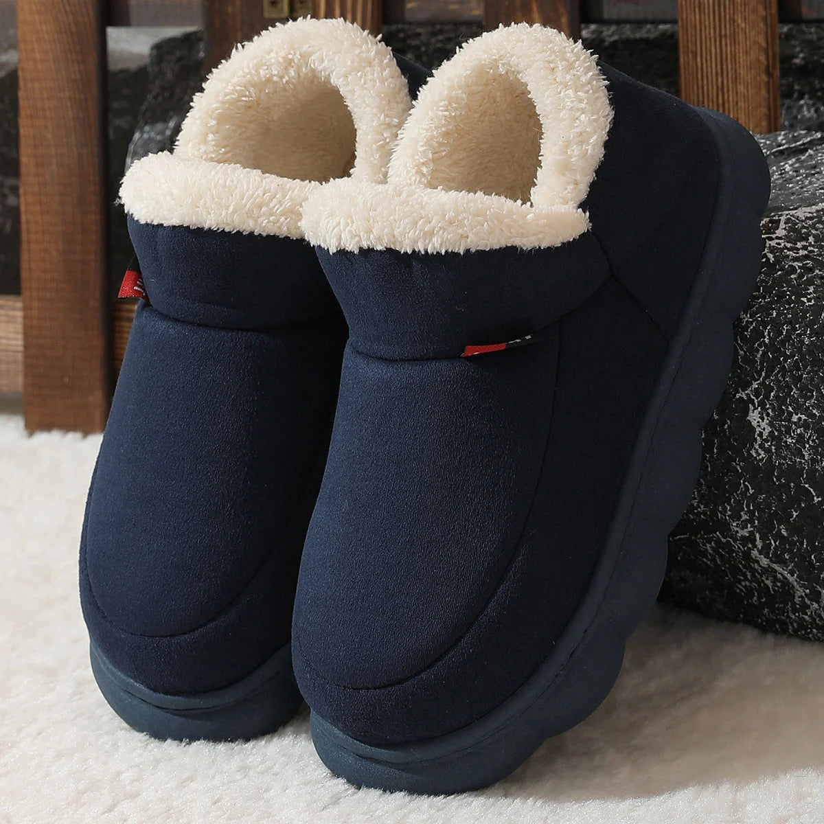 Cosy velvet house slippers for men and women, featuring plush velvet upper, suede lining, and durable rubber soles
