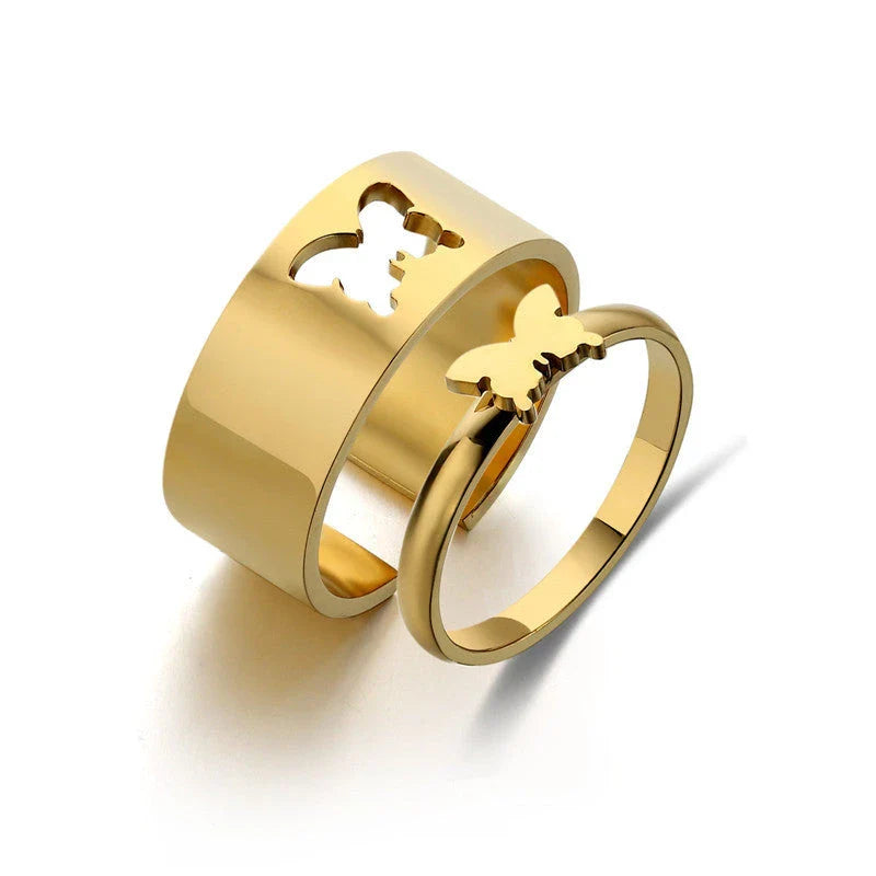 Elegant titanium steel rings in various designs including hearts, butterflies, and crosses, for a timeless and versatile accessory