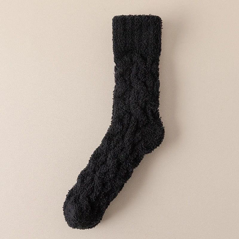 Plush coral fleece socks in various colors, designed for cozy and comfortable home wear