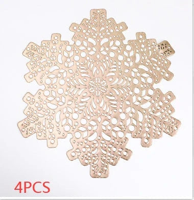 Snowflake-patterned heat-resistant placemats in gold and silver colors, ideal for holiday table settings and decor