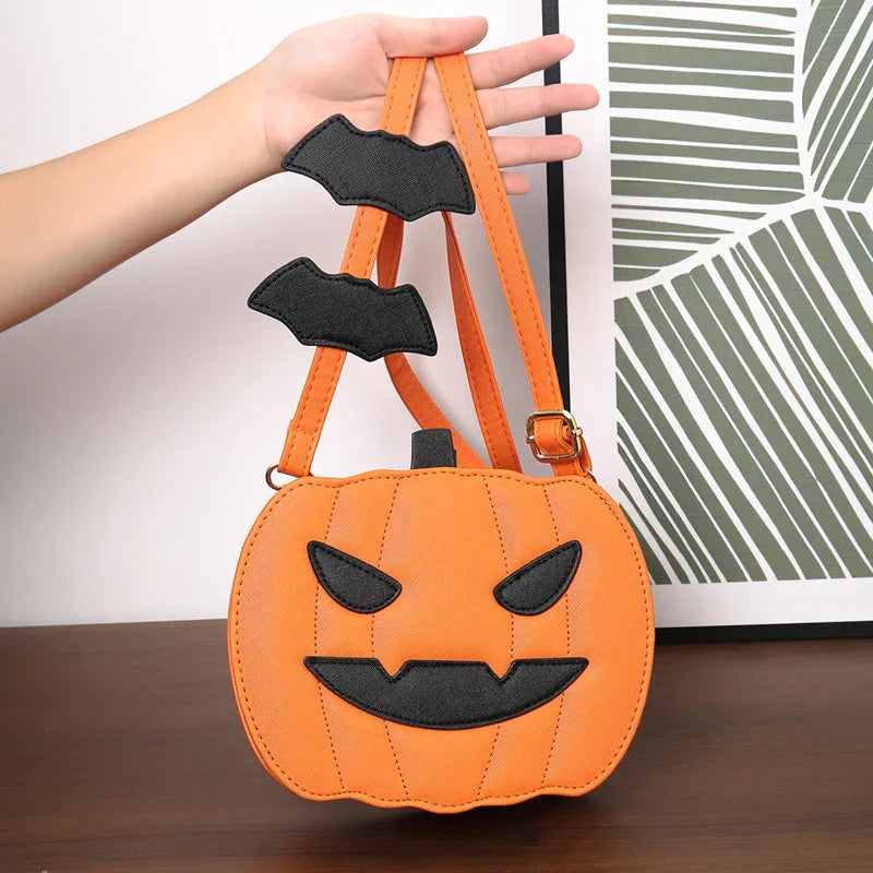 Pumpkin cartoon shoulder bag with adjustable strap and roomy interior, available in various Halloween-inspired colors