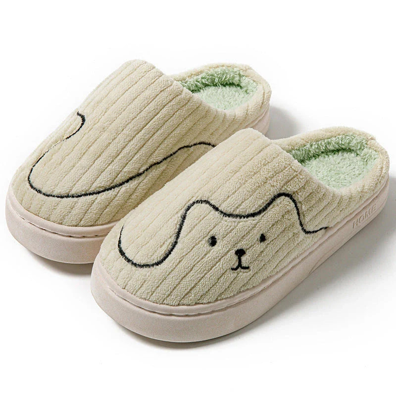 Cozy cat-themed house slippers in various colors with plush fabric and non-slip rubber soles