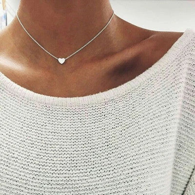 A stylish double-sided love pendant necklace made of premium alloy and featuring a chic geometric design, perfect for elevating any outfit.