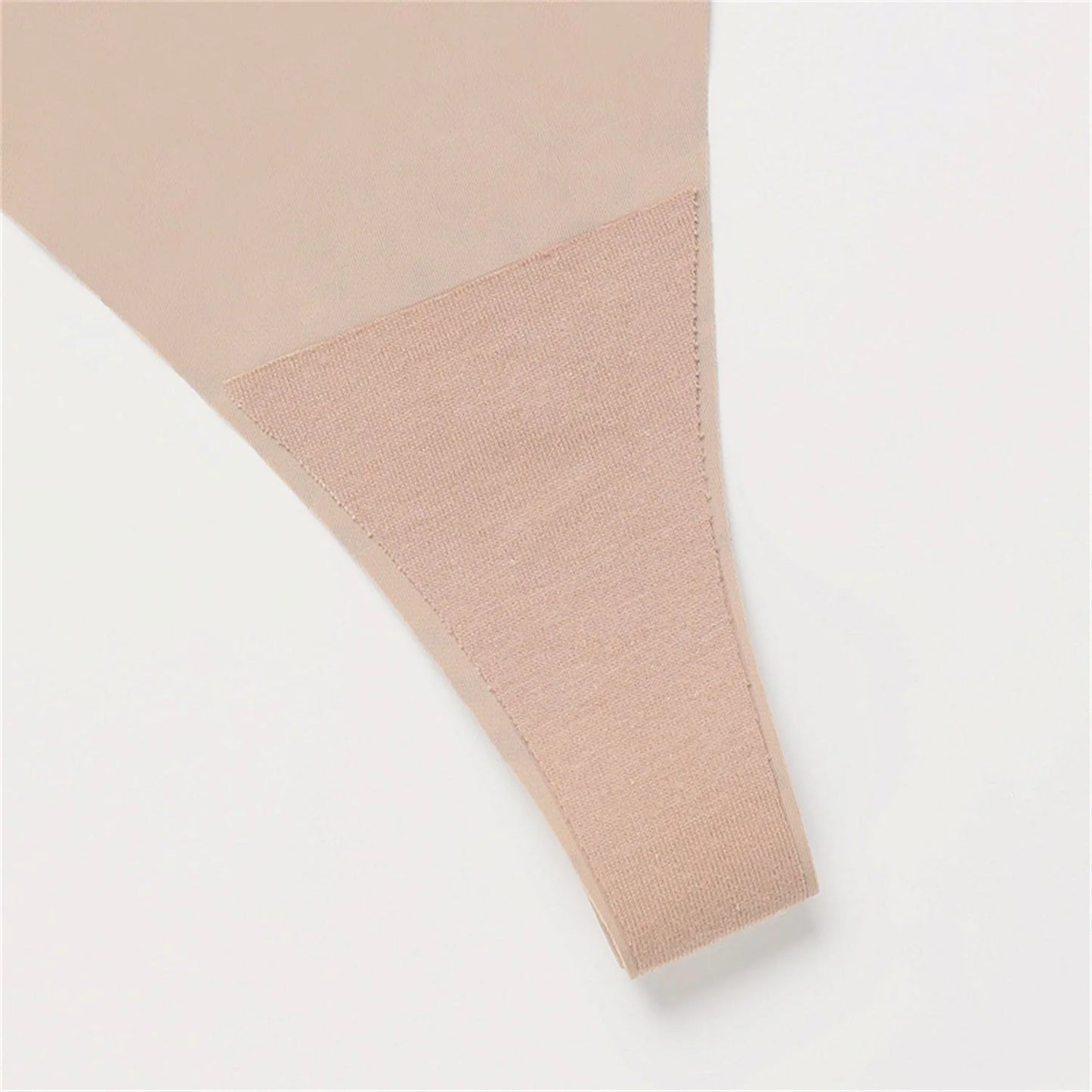 A set of seamless stretch hipster briefs in assorted neutral tones, featuring a low-rise waistline and t-back design for a smooth, flattering look.