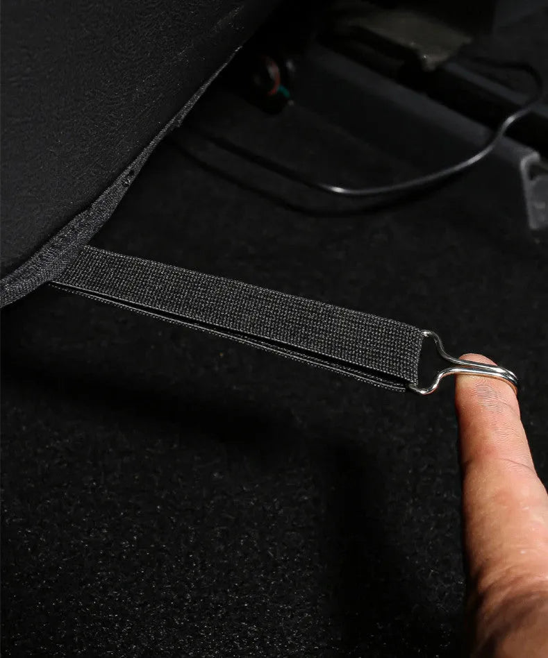 A pair of black leather rear anti kick pads for car seats, shown with dimensions.