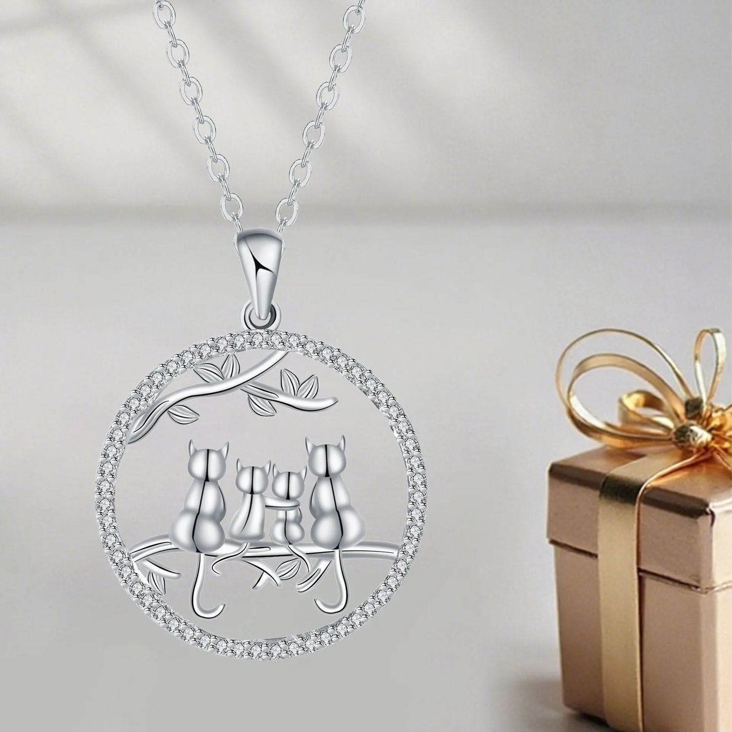 Four kitten necklace with copper pendant and cross chain, cat design jewellery
