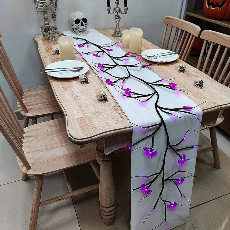 Enchanting Halloween vine lights with playful bat and pumpkin designs, creating a mesmerizing holiday display