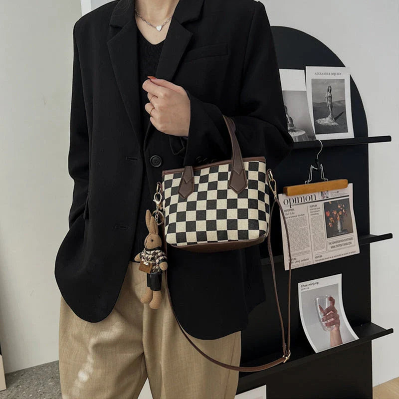 Premium houndstooth and plaid crossbody bags with stylish patterns, comfortable wool material, and versatile design
