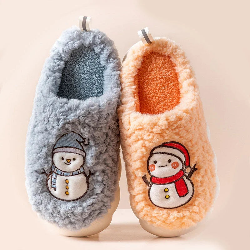 Cozy snowman-themed slippers with plush interior and thick, anti-slip soles for warm, comfortable indoor wear