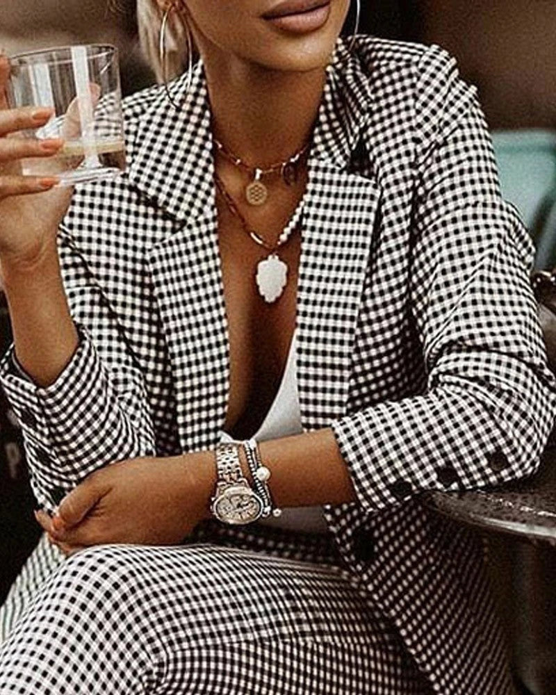 Stylish plaid blazer and pant set for modern women, featuring a slim-fit, tailored design and breathable cotton blend fabric