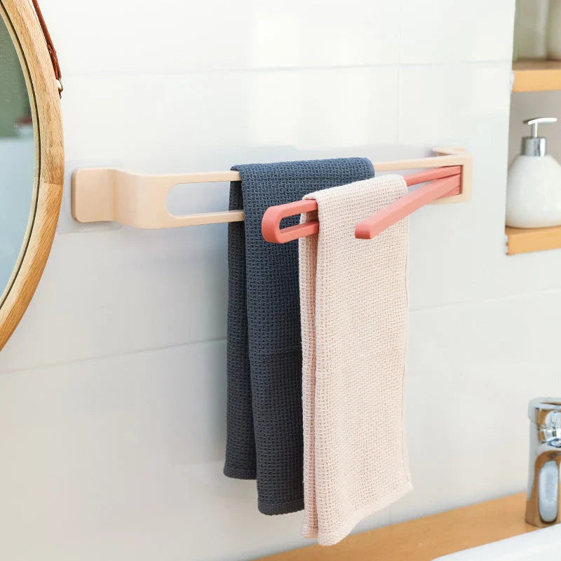 Versatile Towel Organizer with rotating arm, space-saving folding design, and durable plastic construction available in multiple colors