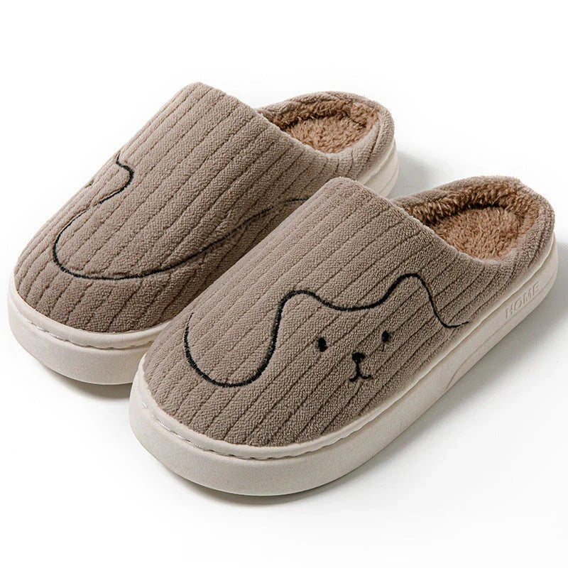 Cozy cat-themed house slippers in various colors with plush fabric and non-slip rubber soles