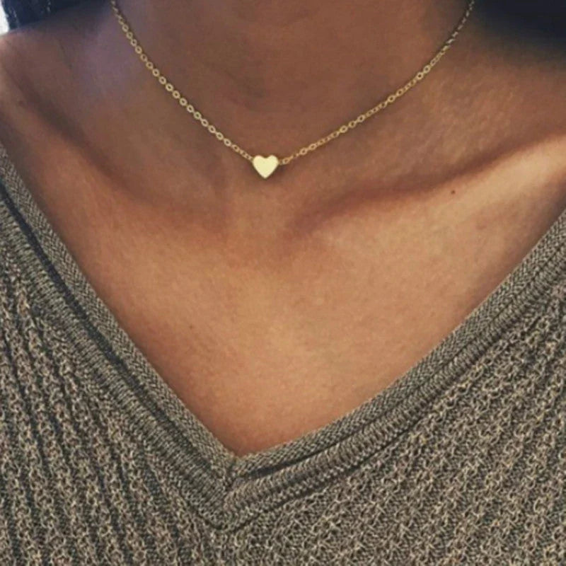 A stylish double-sided love pendant necklace made of premium alloy and featuring a chic geometric design, perfect for elevating any outfit.