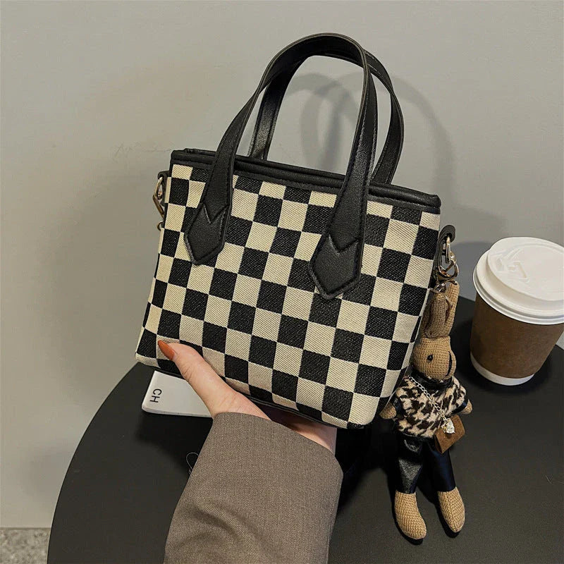 Premium houndstooth and plaid crossbody bags with stylish patterns, comfortable wool material, and versatile design