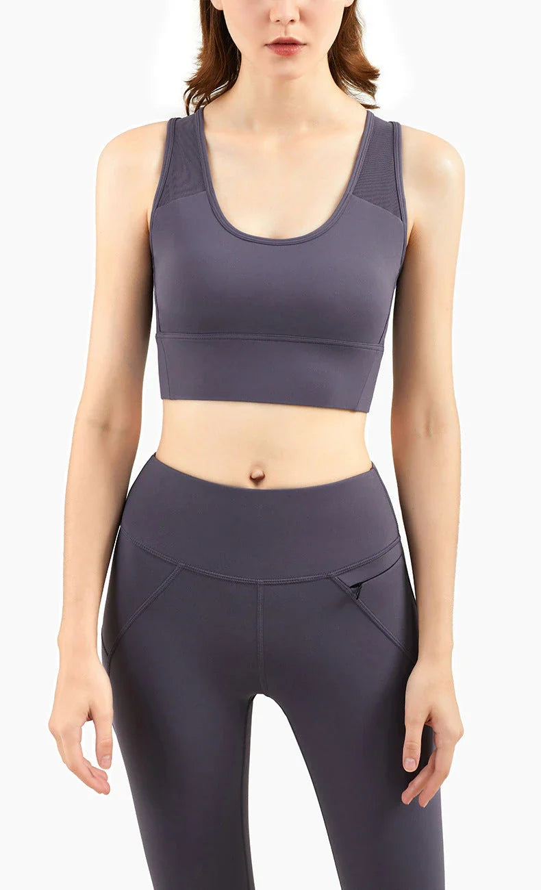 Soft, supportive sports bra with padded cups, V-back design, and moisture-wicking fabric for active women