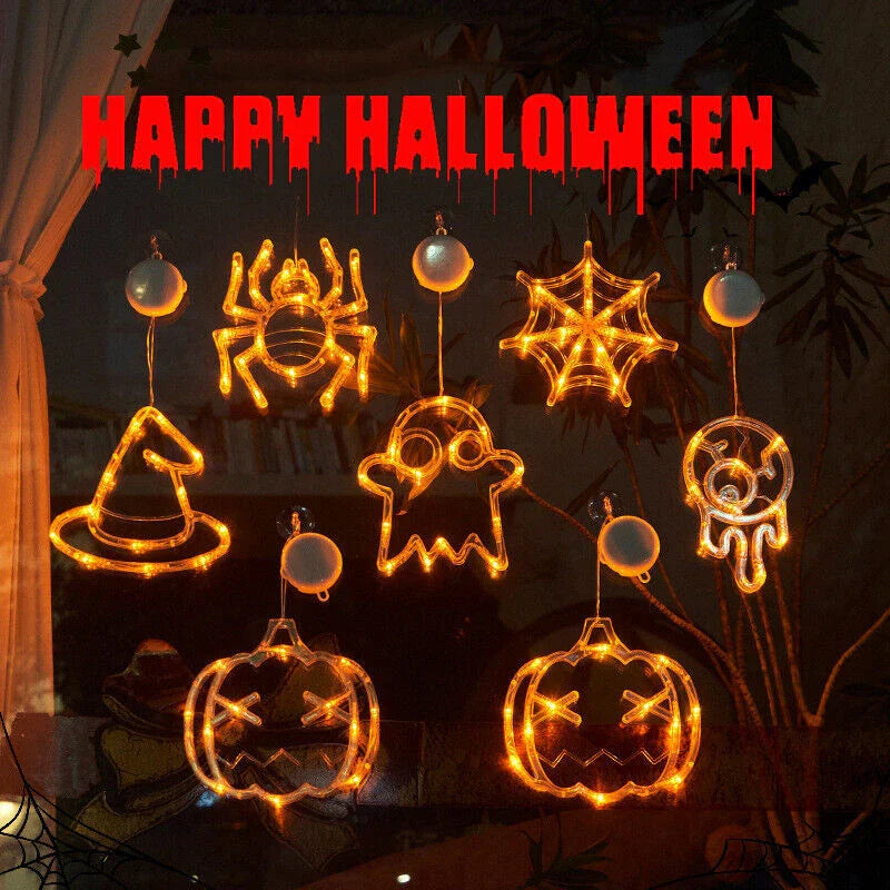 Spooky Halloween window lights featuring ghostly silhouettes, carved pumpkins, and creepy spiders for festive seasonal decor