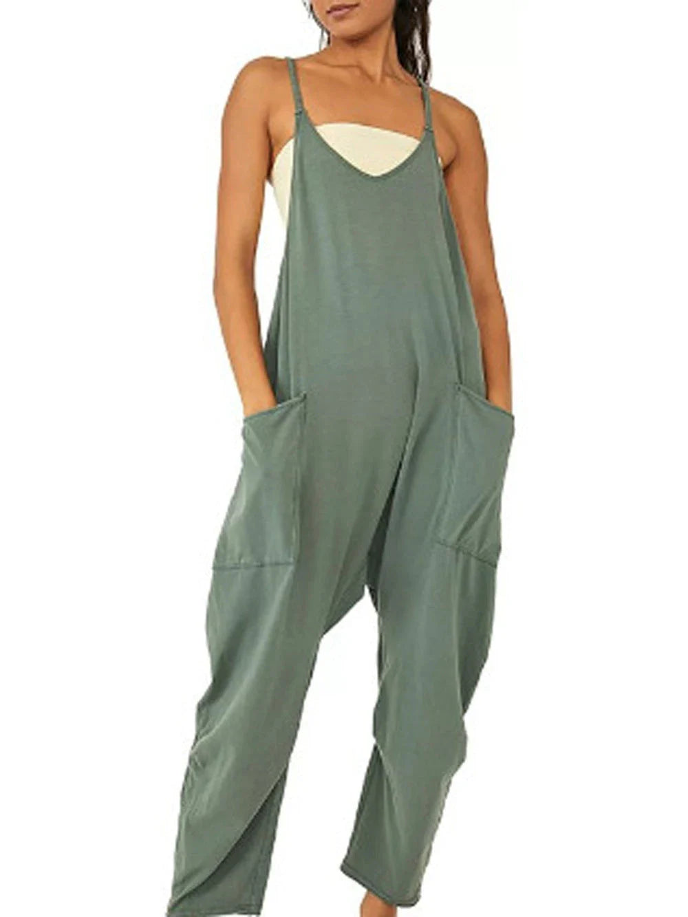 A stylish sleeveless jumpsuit with pockets and zipper closure, available in a variety of colors