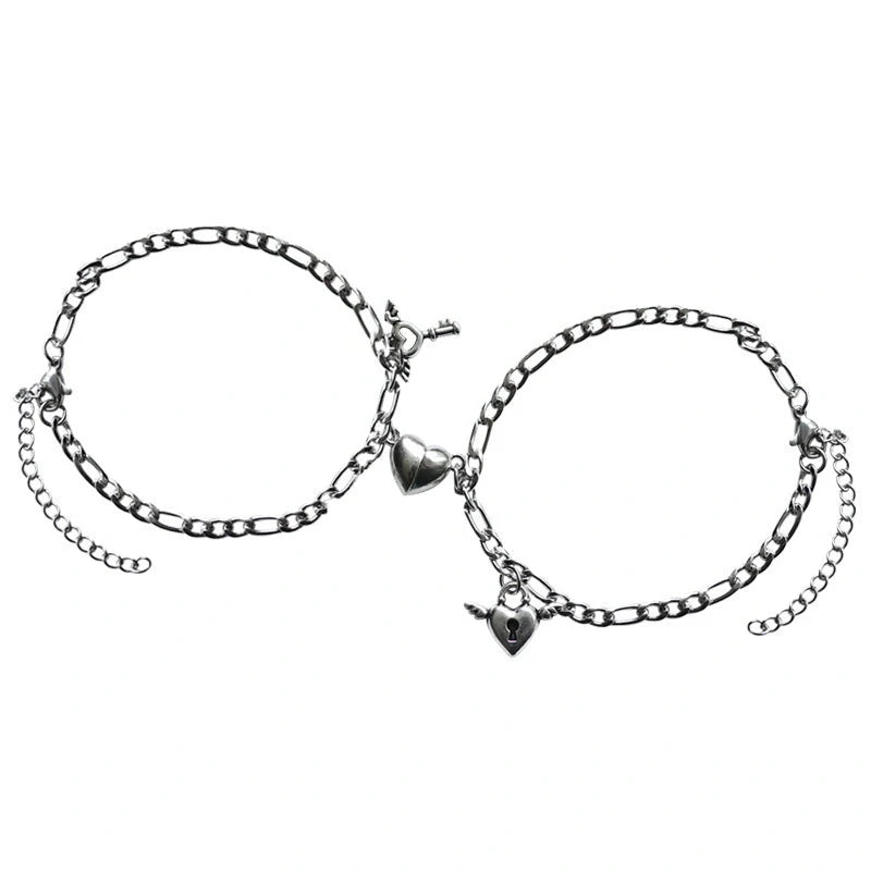 Heart-shaped couple bracelets with adjustable chain, perfect for romantic gifts.