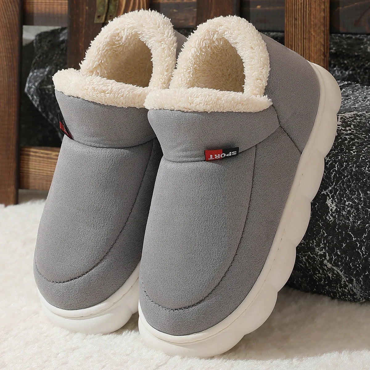 Cosy velvet house slippers for men and women, featuring plush velvet upper, suede lining, and durable rubber soles