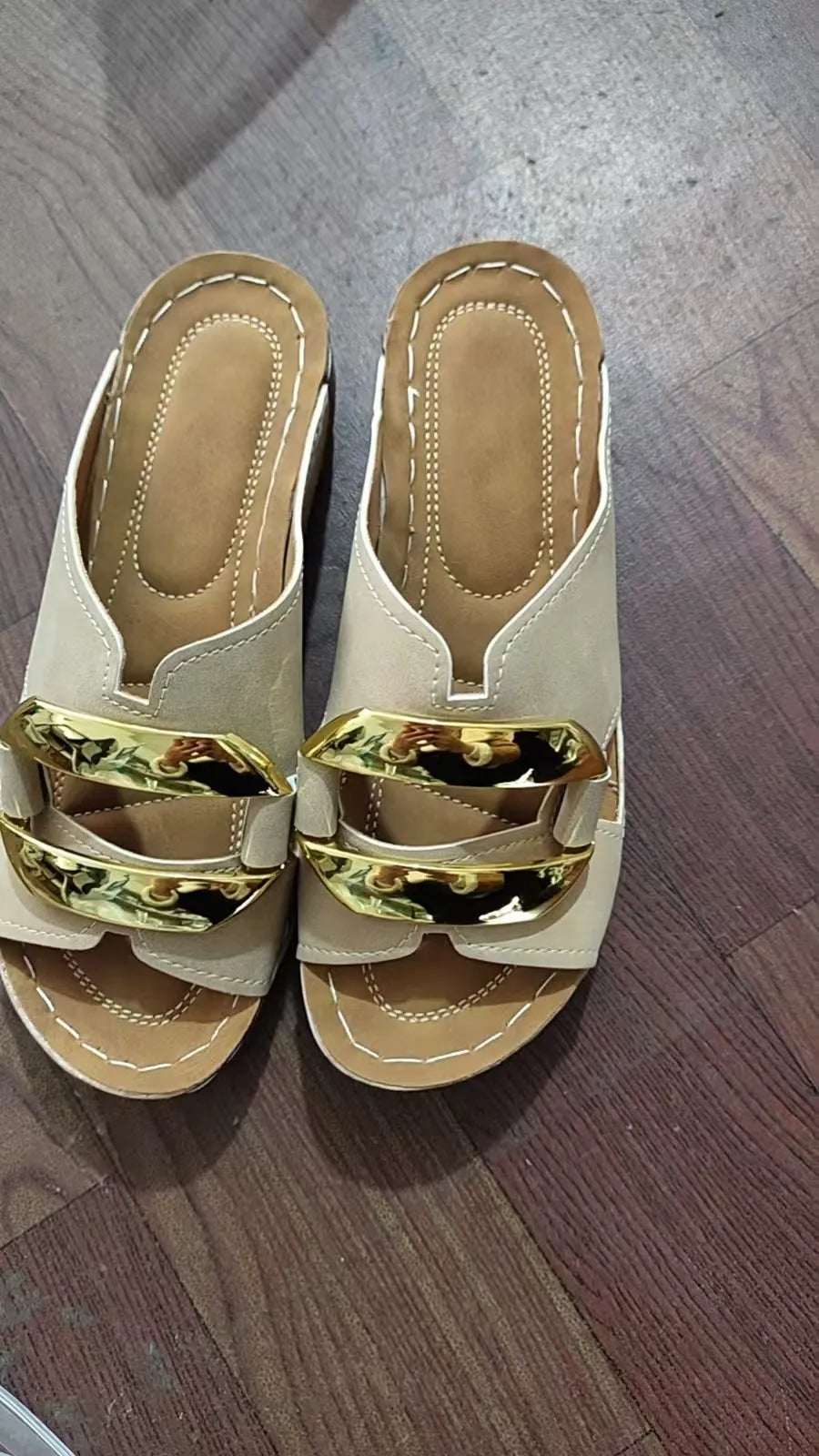 Roman-style platform flip-flop sandals in black, white, khaki, and sea blue on a rubber sole.