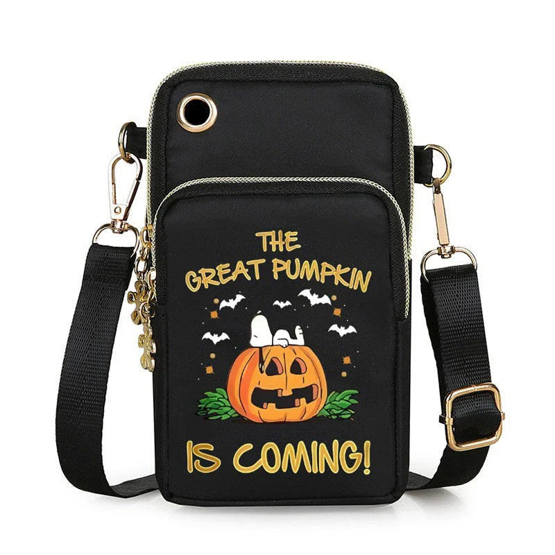 A black crossbody bag with a pumpkin pattern, perfect for Halloween celebrations and everyday use.