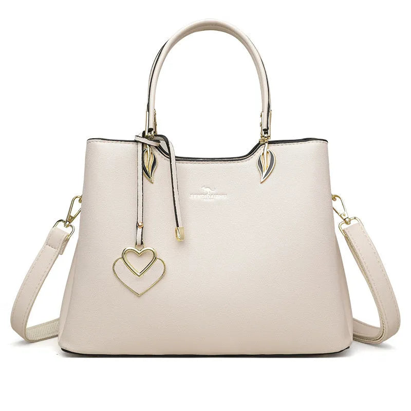 Black women's multi-layer PU leather shoulder messenger bag with sewing thread detail.