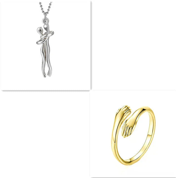 Stylish embracing pendant necklace in various colors, including rose gold, white black, black gold, and more. Minimalist design with a delicate chain.