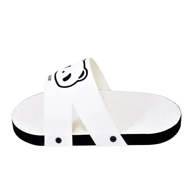 White slipper-style corrugated paper cat scratch board on a floor
