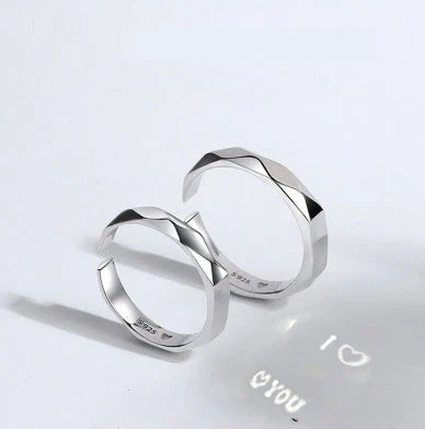 Elegant S925 sterling silver rings with a hidden love pattern design, adjustable sizing for a personalized fit.