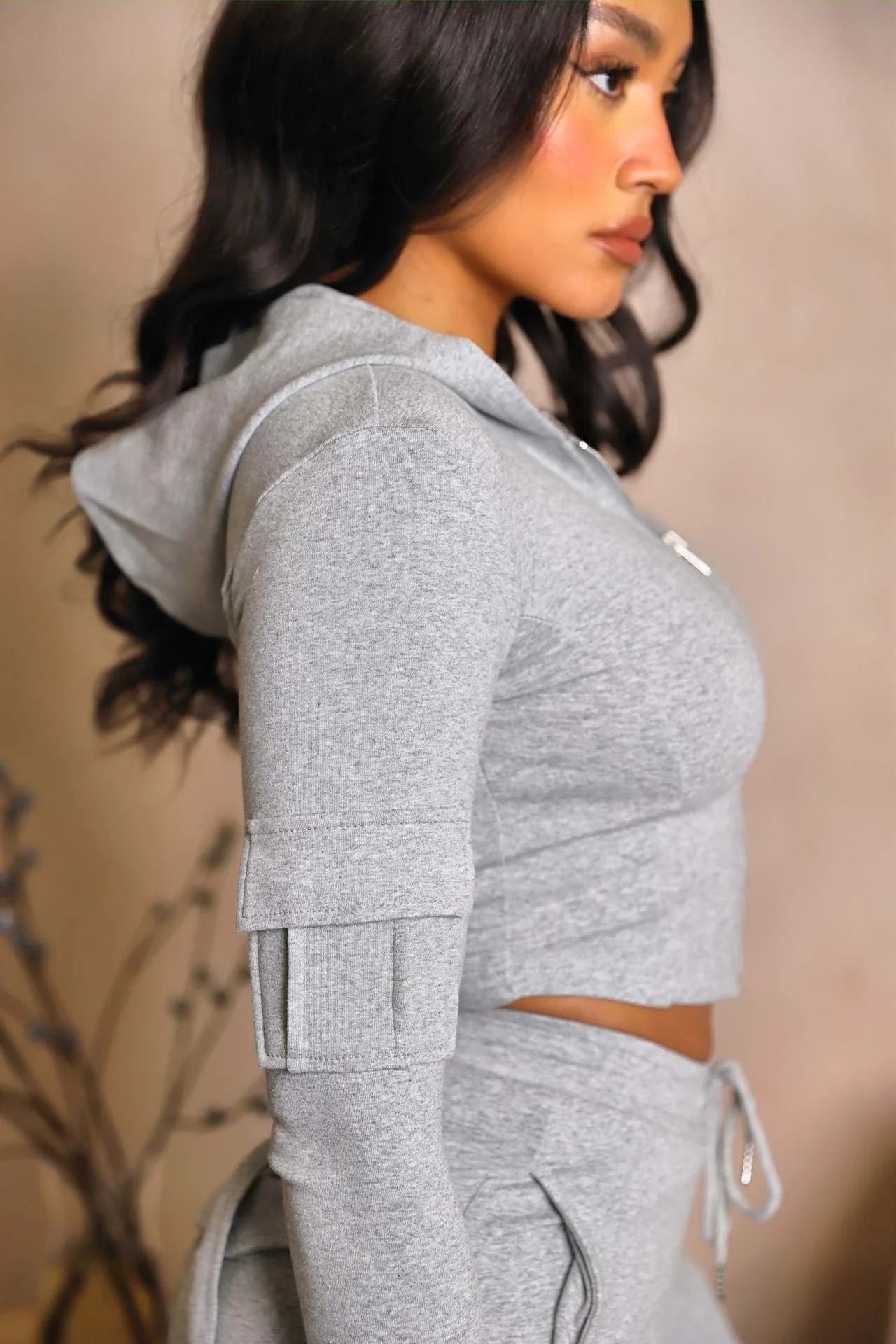 Versatile cargo pants for women with pockets, high-waist, drawstring, and wide-leg design in various colors and sizes