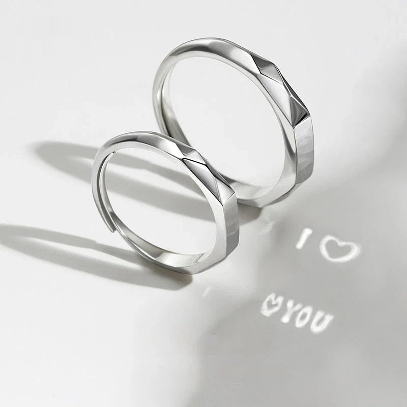 Elegant S925 sterling silver rings with a hidden love pattern design, adjustable sizing for a personalized fit.