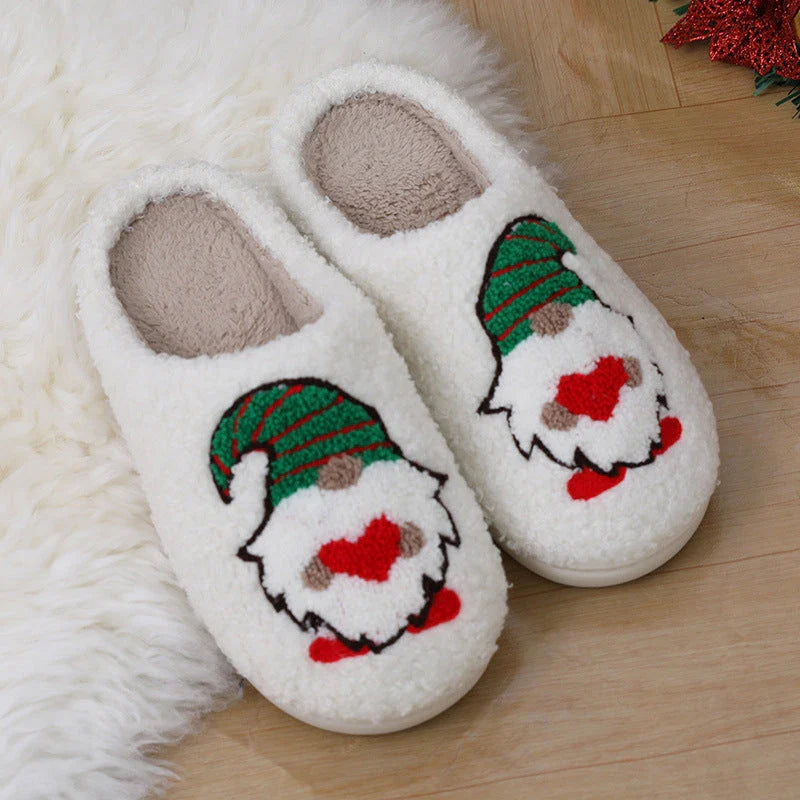 Cozy Santa Claus-themed slippers with plush upper and anti-slip soles for comfortable indoor wear during the holidays