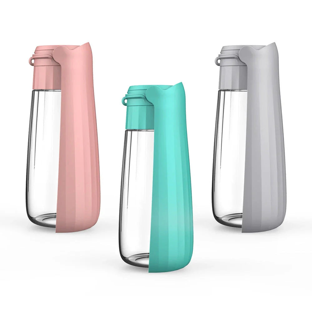 Portable folding dog water bottle with large 550ml capacity, available in multiple vibrant colors