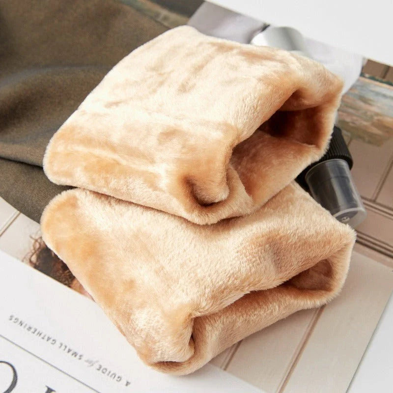 Cozy fleece-lined tights in various colors, featuring a unique translucent design and high-waisted fit for warmth and style.