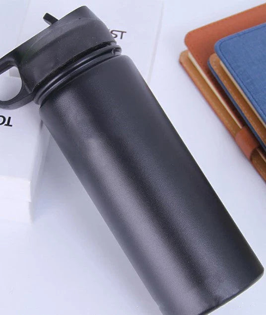 Stainless steel insulated water bottle with wide mouth and push-button lid for hot and cold beverages
