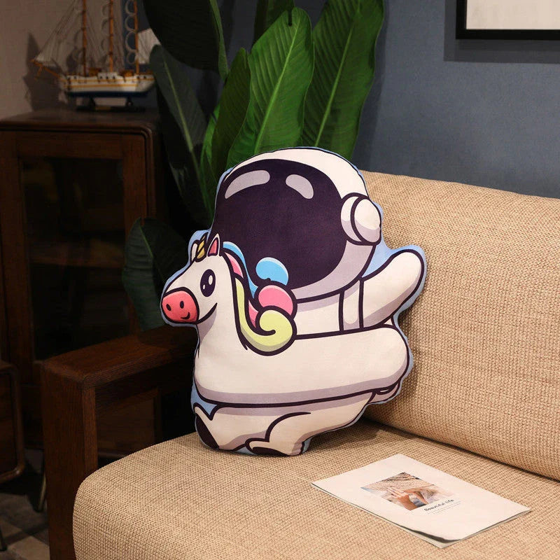 Soft plush astronaut pillows in various space-themed designs, including rockets, spacecraft, and more