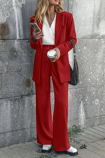 Tailored ladies' suit in various colours, featuring a jacket and trousers made of premium polyester fabric.