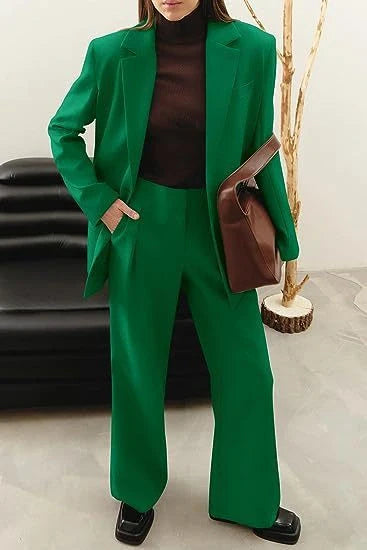 Tailored ladies' suit in various colours, featuring a jacket and trousers made of premium polyester fabric.