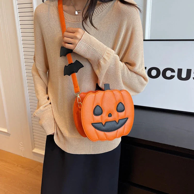 Pumpkin cartoon shoulder bag with adjustable strap and roomy interior, available in various Halloween-inspired colors