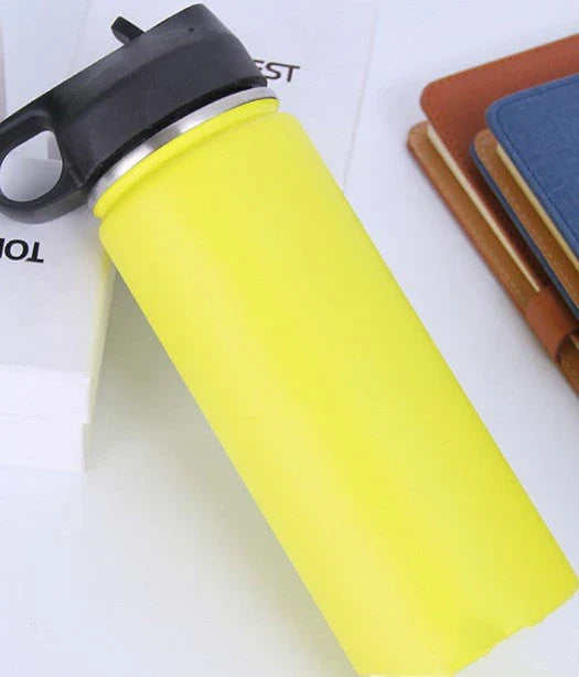 Stainless steel insulated water bottle with wide mouth and push-button lid for hot and cold beverages