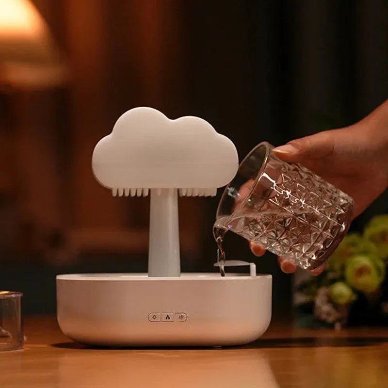 Cloud-shaped humidifier with color-changing LED lights, designed for improved air moisture and aromatherapy enjoyment