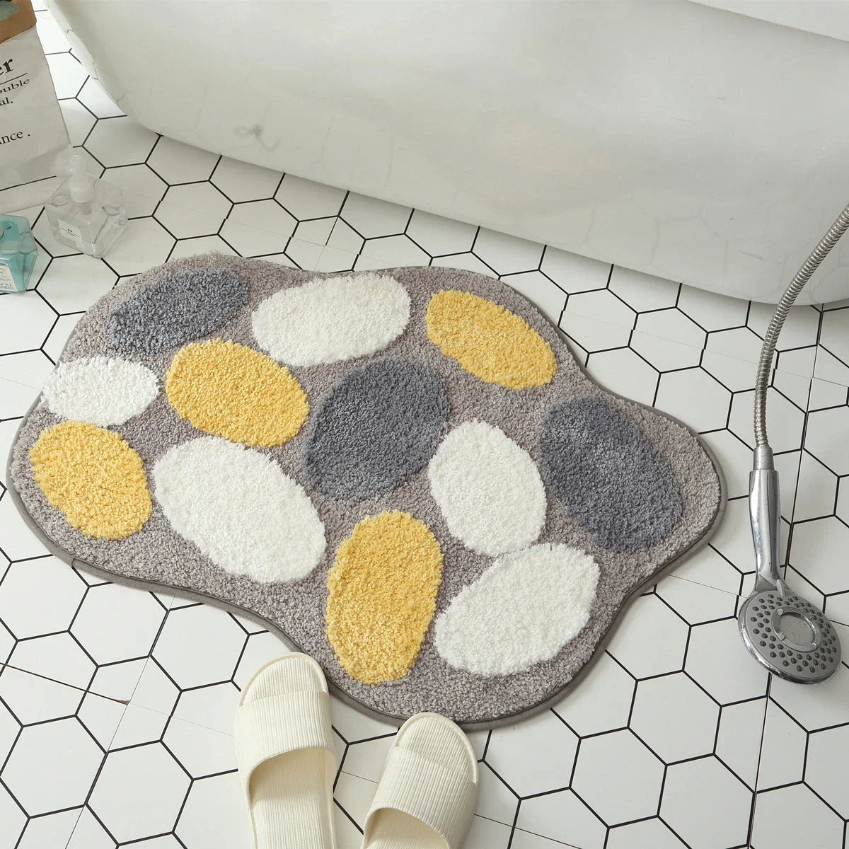 Stylish and absorbent egg-shaped doormat in various sizes and colors, made of plush polyester with a non-slip rubber backing