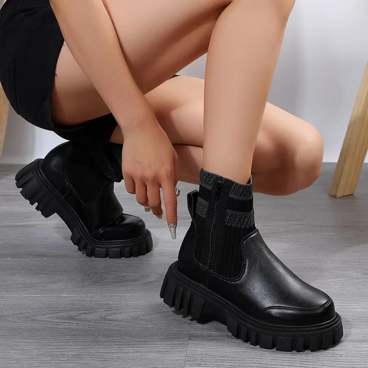 Stylish mid-calf boots with zipper closure, non-slip rubber sole, and knitted patchwork upper in beige, black, and brown colors.