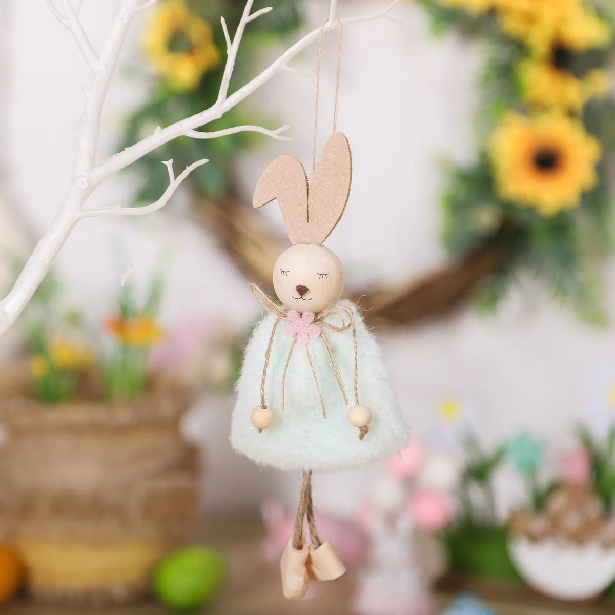 Cartoon rabbit cloth pendant Easter decoration hanging from a ribbon.