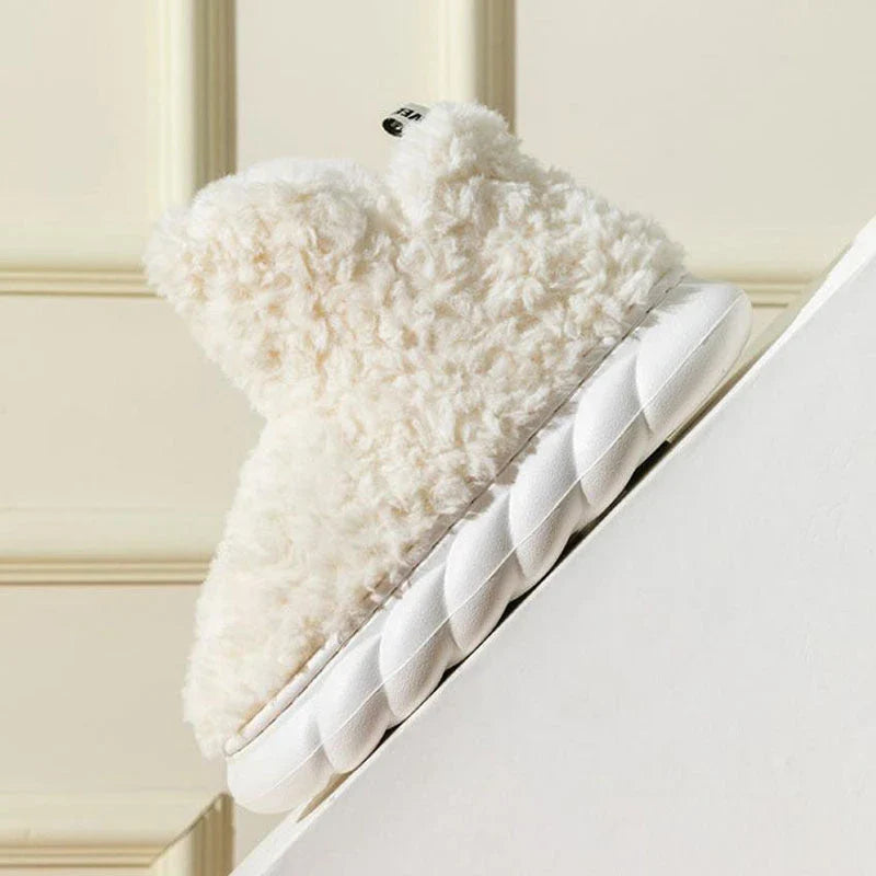 Cozy plush waterproof slippers in a variety of vibrant colors, featuring a stylish design and durable construction for indoor and outdoor wear