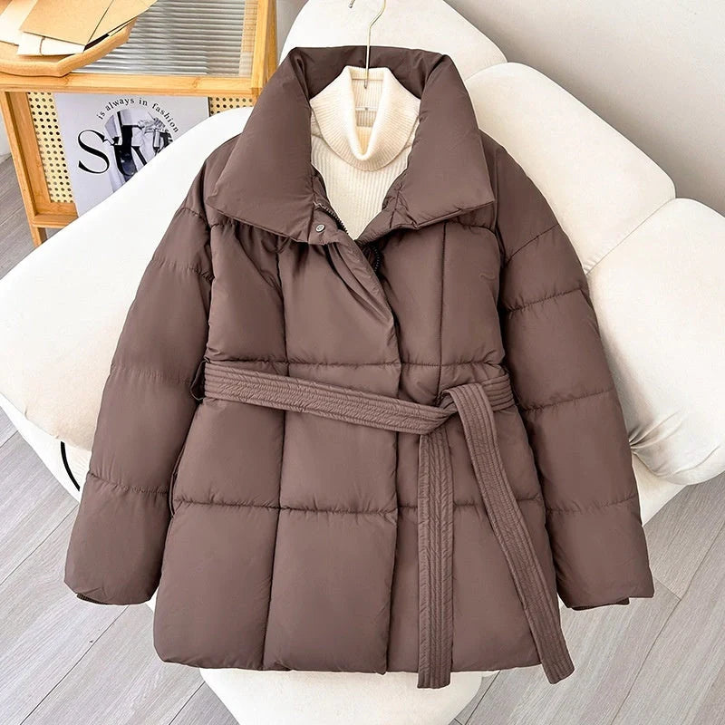Stylish plaid belted winter coat for women in black, white, and brown