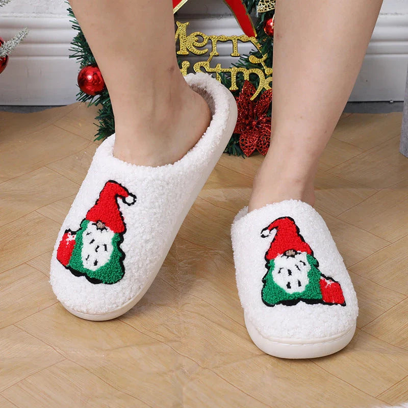 Cozy Santa Claus-themed slippers with plush upper and anti-slip soles for comfortable indoor wear during the holidays